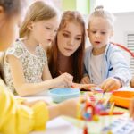 Children Painting With Water Color